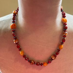 Orange/red/blue beaded necklace. Worn several times. Listing #7270